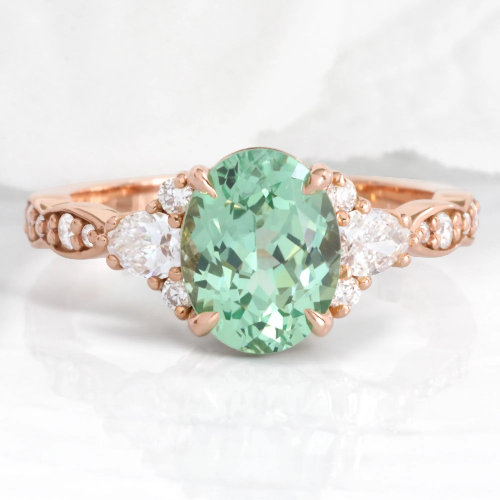 2.85 Ct. Oval Green Sapphire Ring in Dahlia 3 Stone Diamond Band