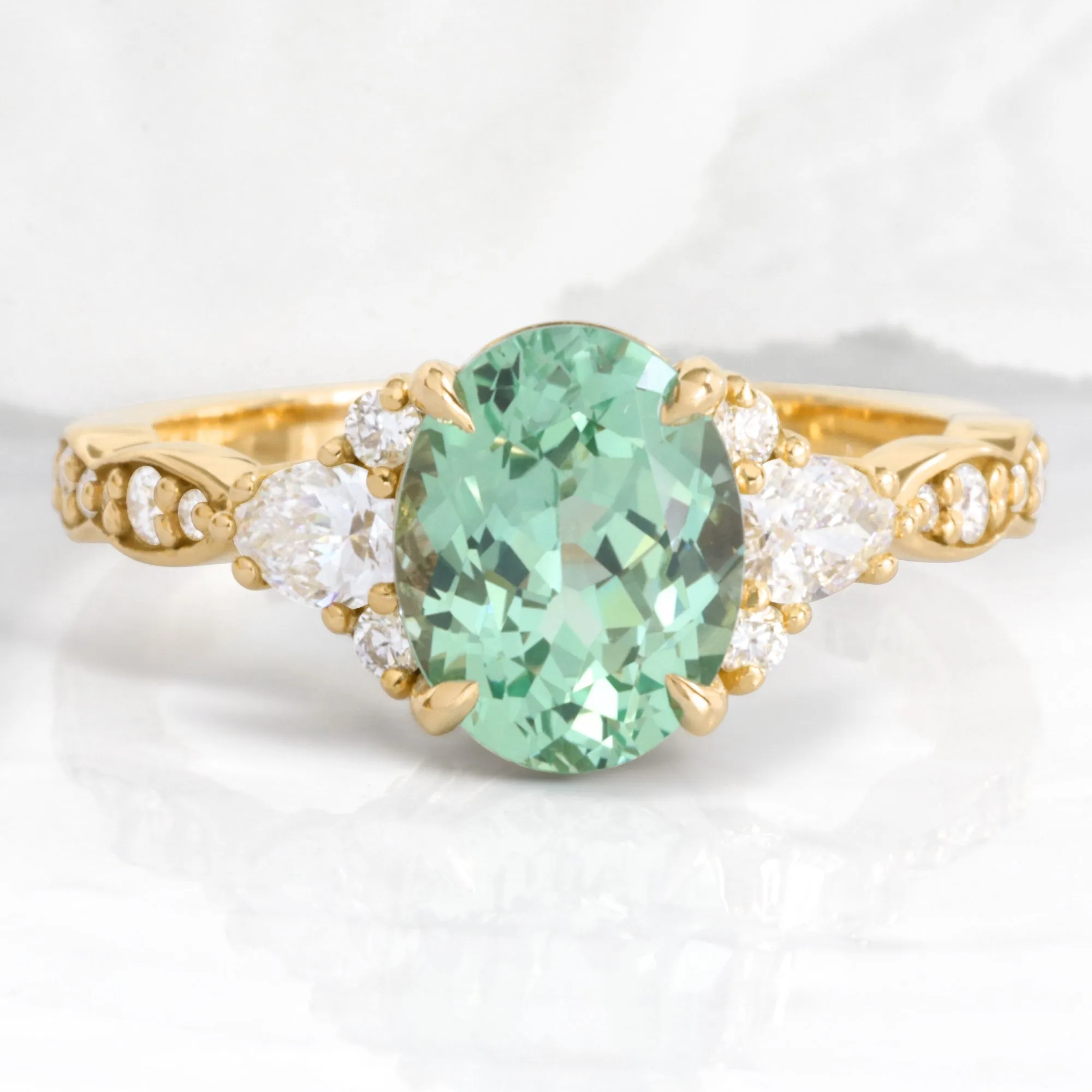 2.85 Ct. Oval Green Sapphire Ring in Dahlia 3 Stone Diamond Band