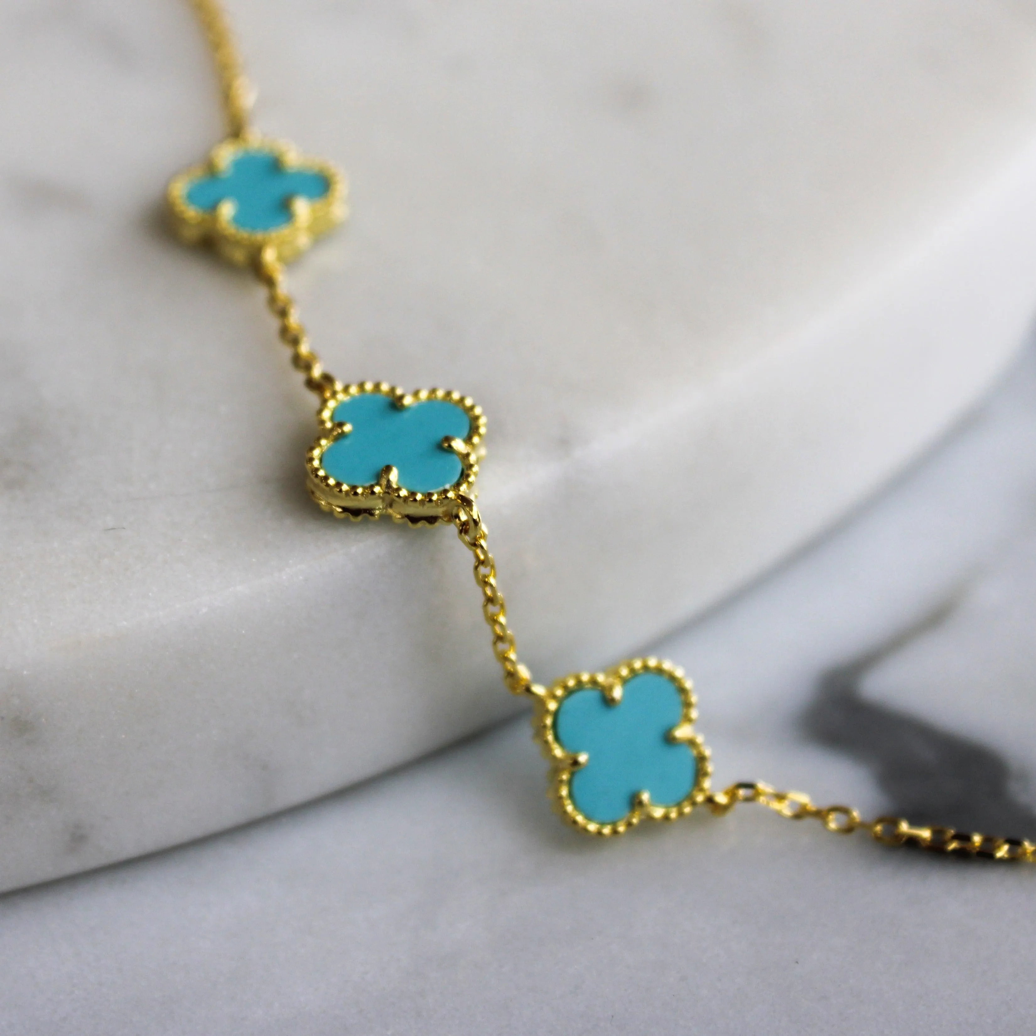 Gold Bracelet with Multi Turquoise Clover Shape