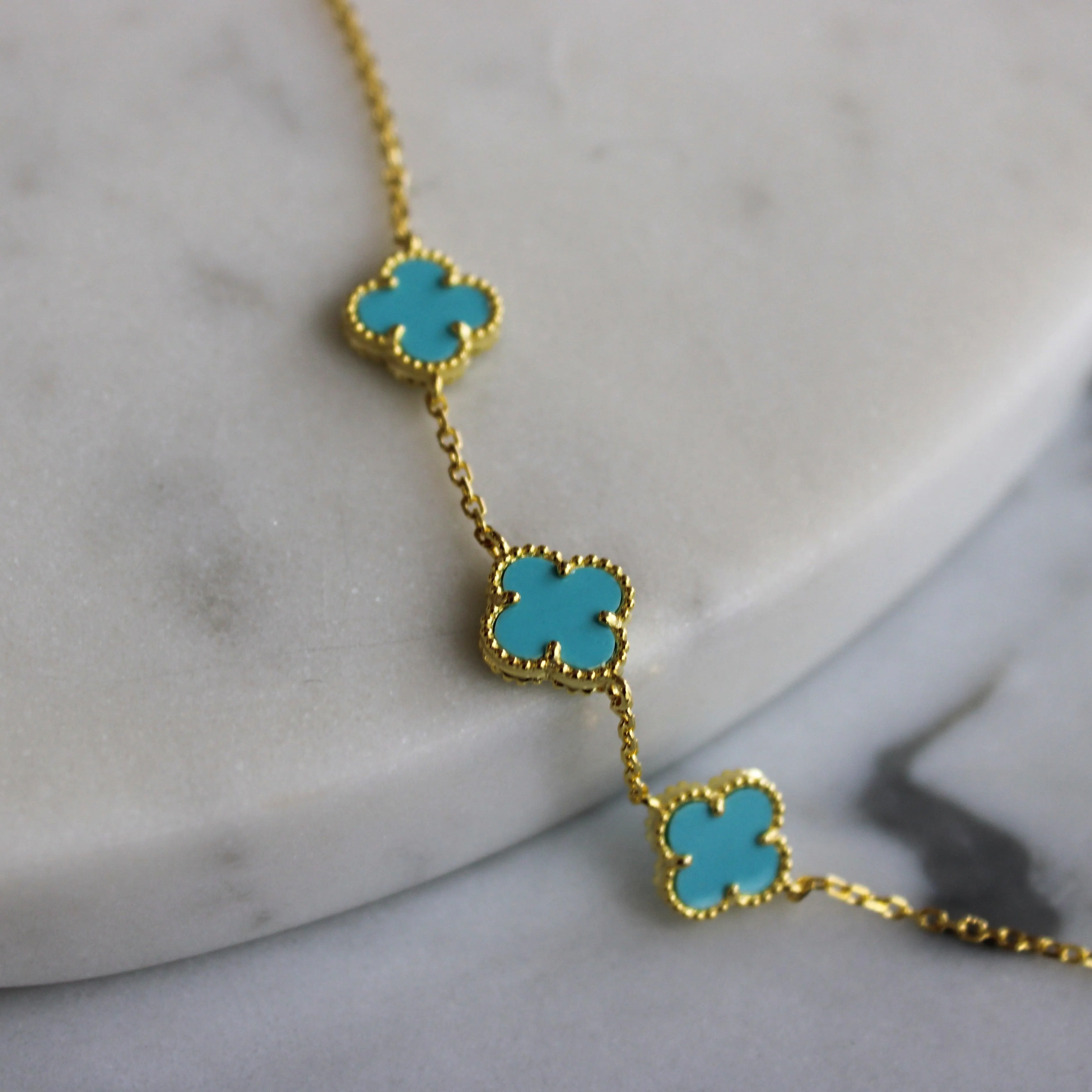 Gold Bracelet with Multi Turquoise Clover Shape